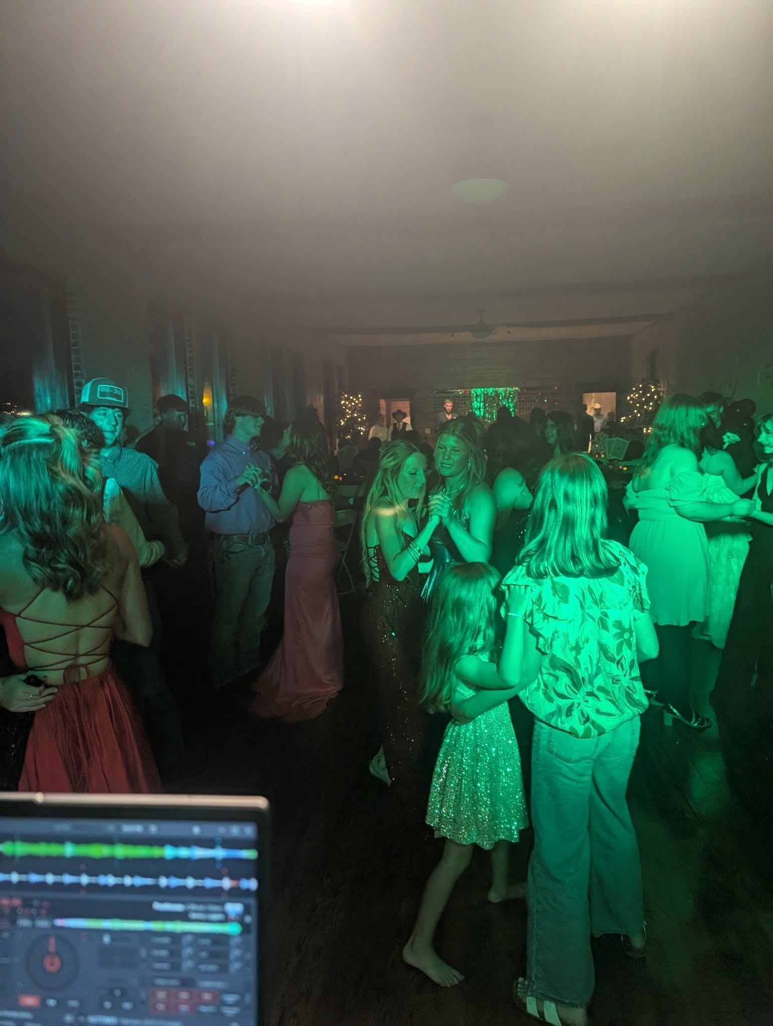 Couple slow dancing at DJ Wildman prom