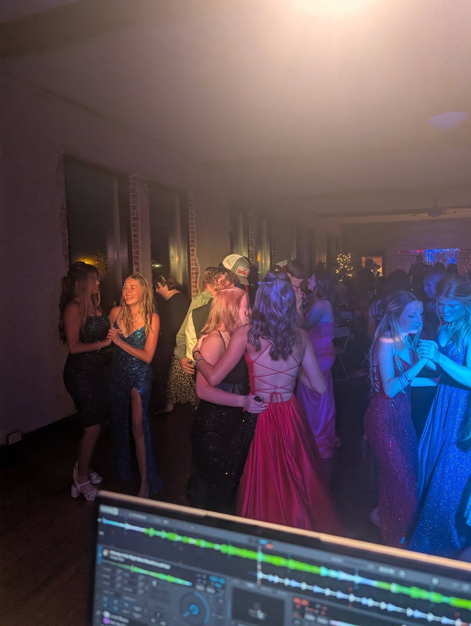 Couple dancing at DJ Wildman prom event